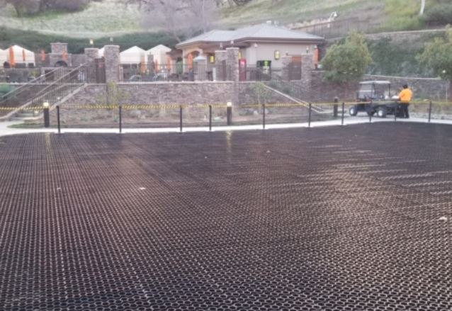 Finished grass paver parking area built with EZ Roll