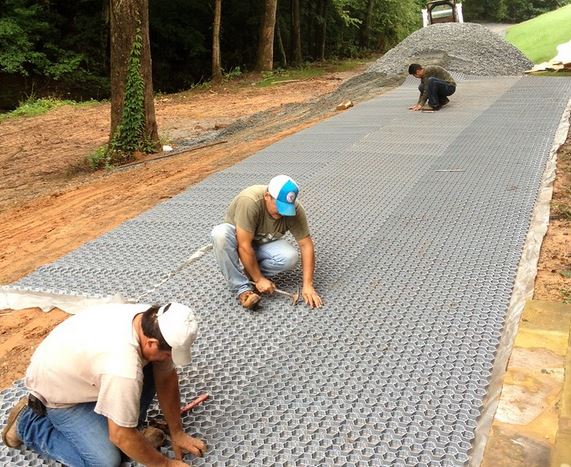 Installing EZ Roll Gravel Paver over compacted aggregate base